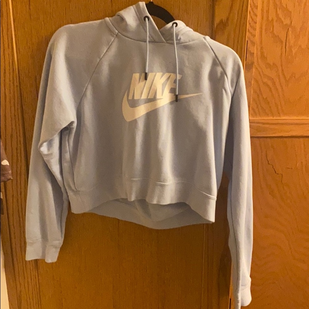 Cropped blue Nike sweatshirt